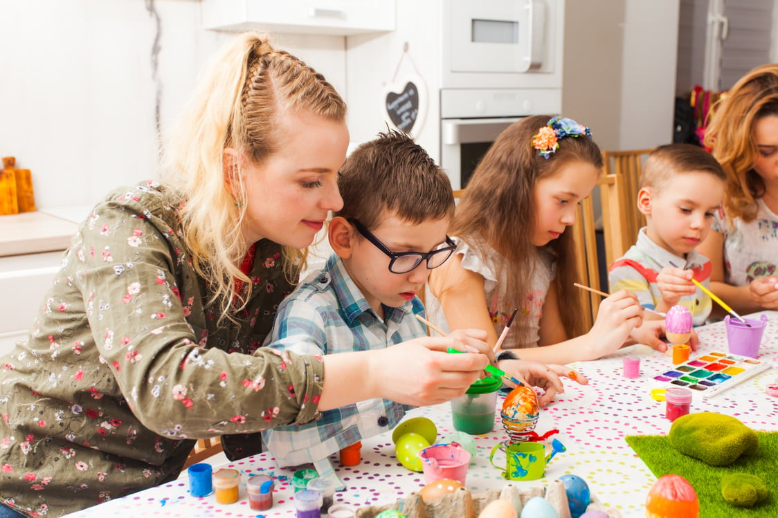 Parents and Kids Painting Easter Eggs Together